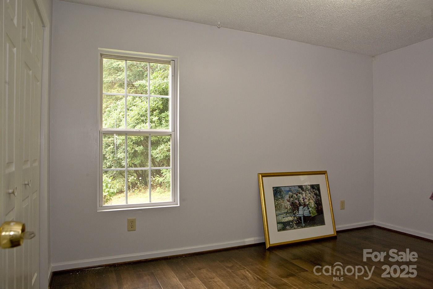 165 Peepeye Cove Road Leicester, NC 28748 - Photo 4 of 24 an empty room with a window