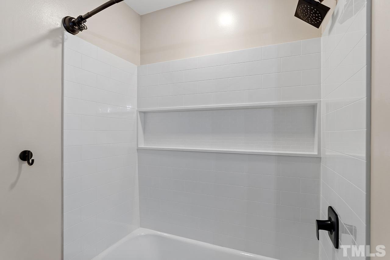 2609 Elmhurst Circle Raleigh, NC 27610 - Photo 19 of 34 a close up of a shower