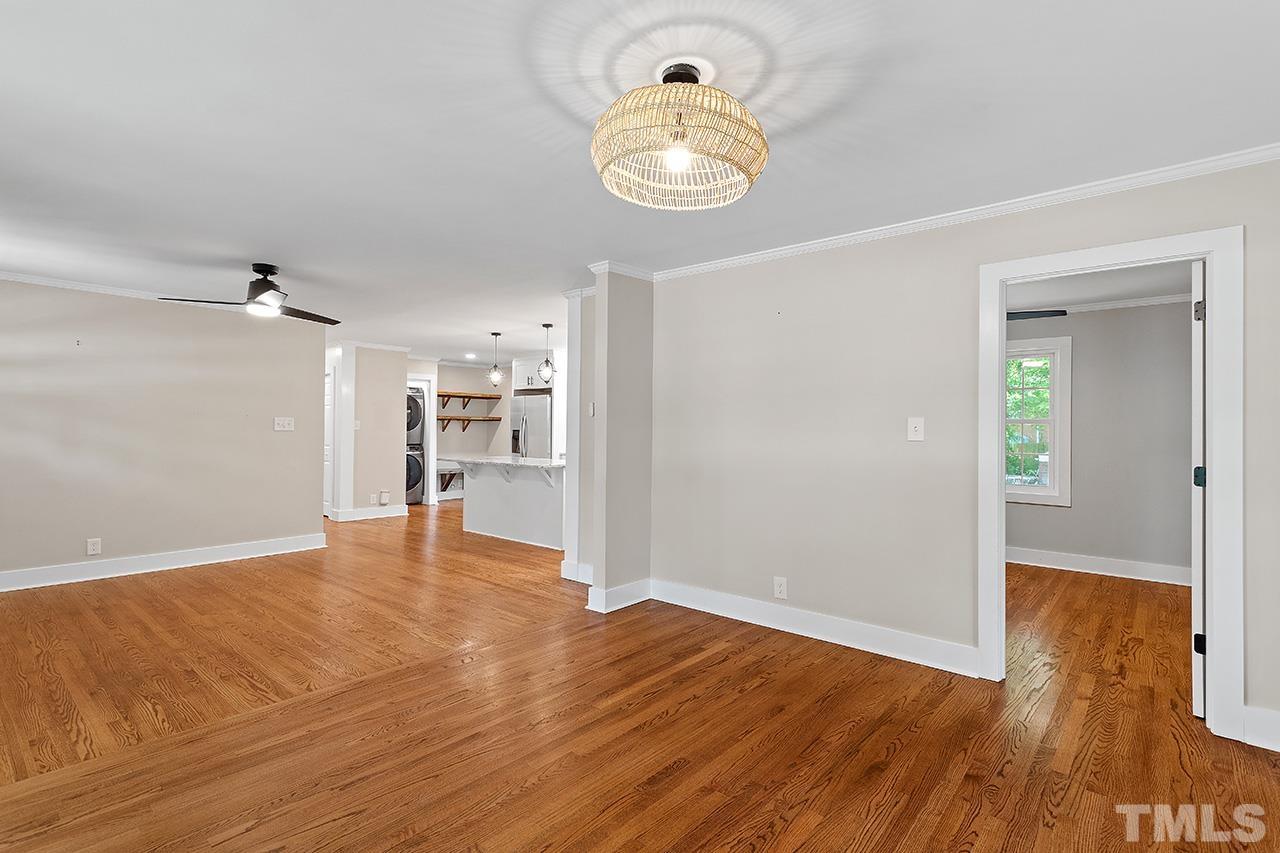 2609 Elmhurst Circle Raleigh, NC 27610 - Photo 30 of 34 wooden floor in an empty room with a window