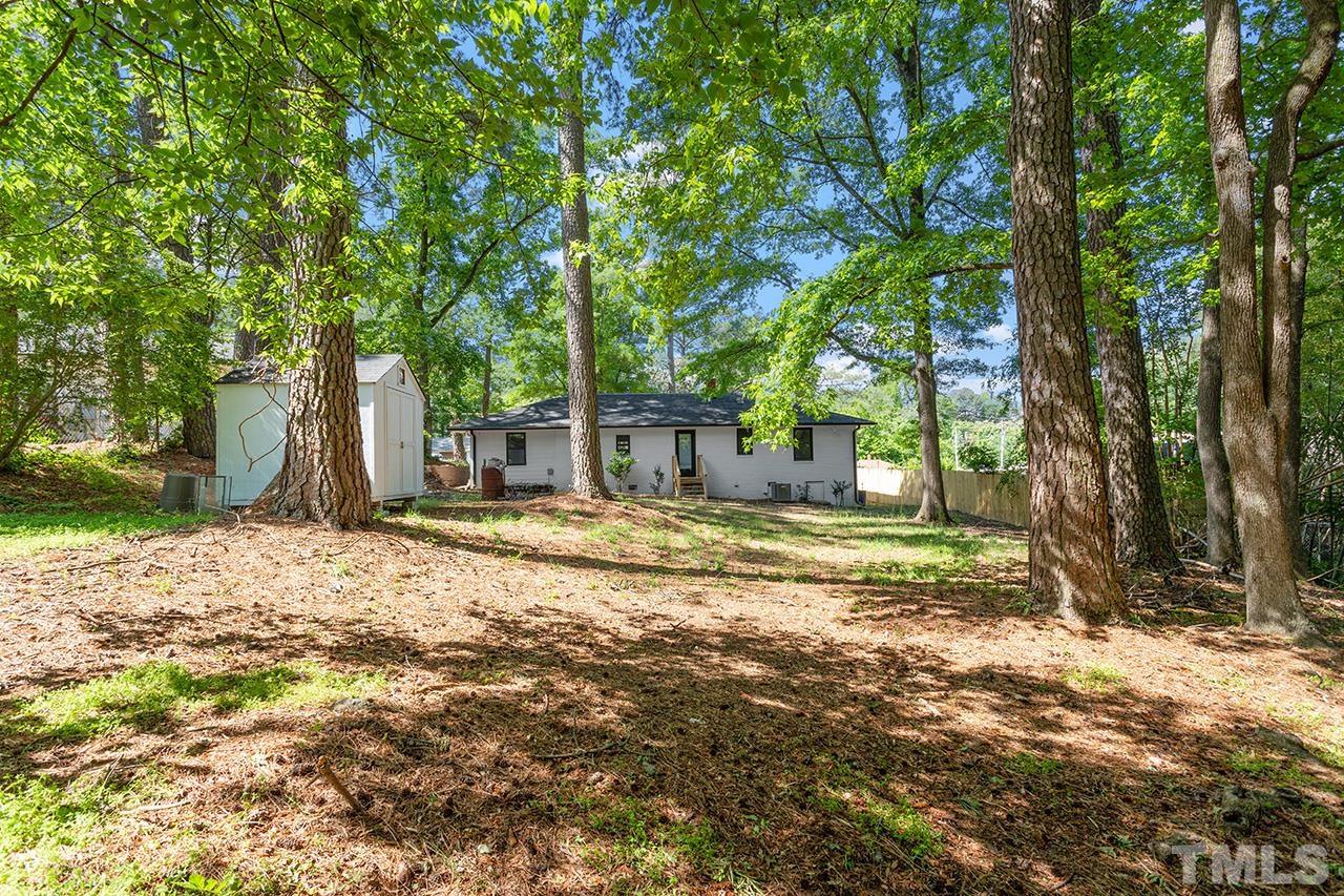 2609 Elmhurst Circle Raleigh, NC 27610 - Photo 32 of 34 a view of a house with a yard