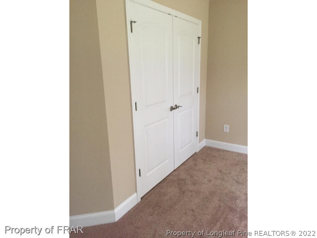 804 Raspberry Road Stedman, NC 28391 - Photo 32 of 34 a view of a hallway