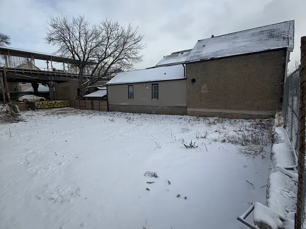 a front view of a house with parking
