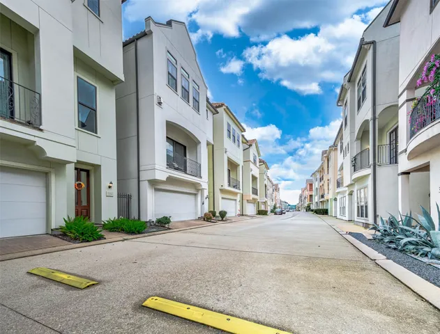 a view of a street with buildings