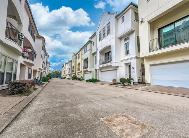 a view of a street with buildings