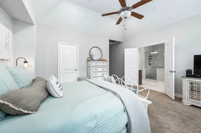 a bathroom with a granite countertop sink a bathtub and shower
