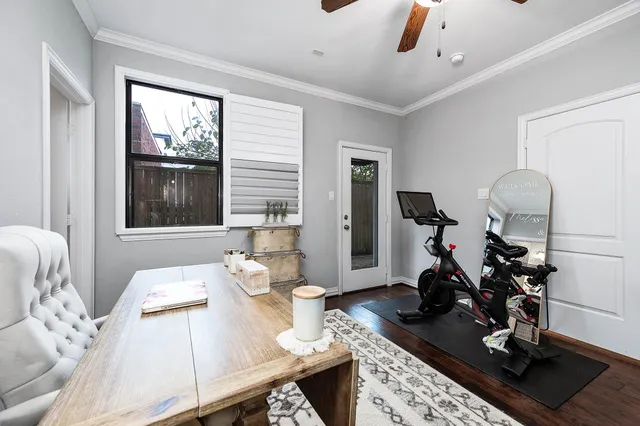 a bathroom with a granite countertop sink a toilet a mirror a vanity and shower