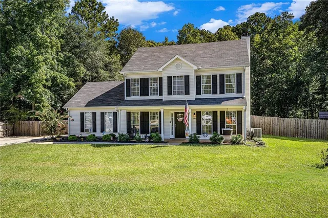 front view of a house with a yard