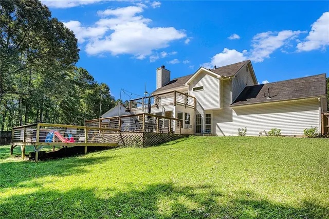 front view of a house with a big yard
