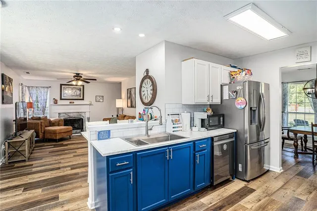 a spacious bathroom with a double vanity sink and a mirror