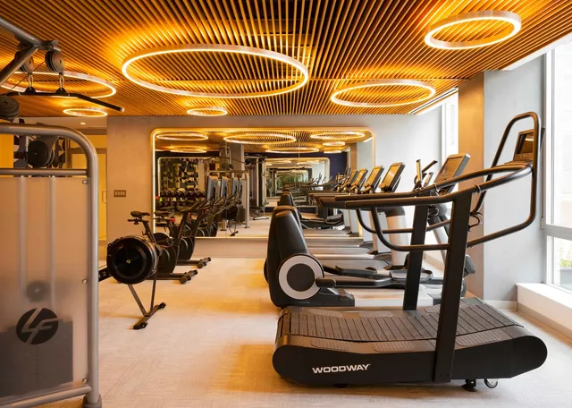 a view of an outdoor kitchen and a patio