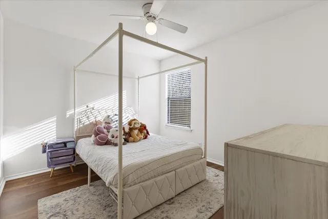 a bedroom with furniture and a bed