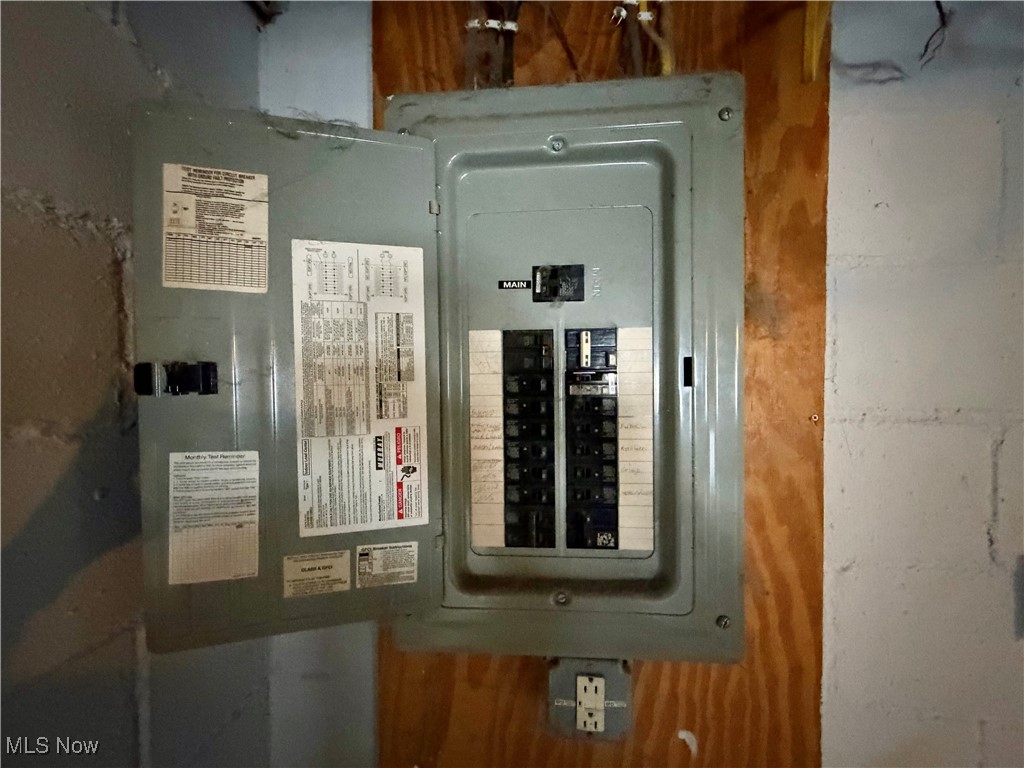 34 West Lewis Street Struthers, OH 44471 - Photo 13 of 14 Utility room featuring electric panel