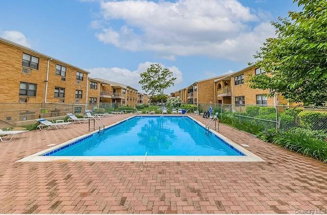 214 Westend Avenue, Unit 6C Freeport, NY 11520 - Photo 16 of 17 a view of swimming pool with outdoor seating