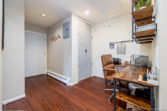 214 Westend Avenue, Unit 6C Freeport, NY 11520 - Photo 4 of 17 a workspace with furniture and wooden floor