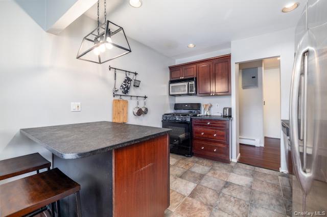 214 Westend Avenue, Unit 6C Freeport, NY 11520 - Photo 8 of 17 a kitchen with stainless steel appliances granite countertop a sink refrigerator and cabinets
