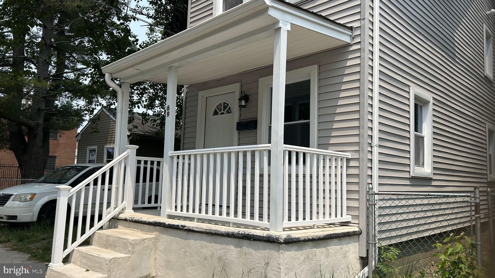 69 Carpenter Street Salem, NJ 08079 - Photo 28 of 29 a view of a porch with a bench