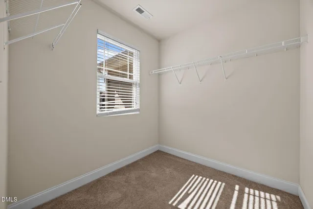 a view of small space with racks on the wall