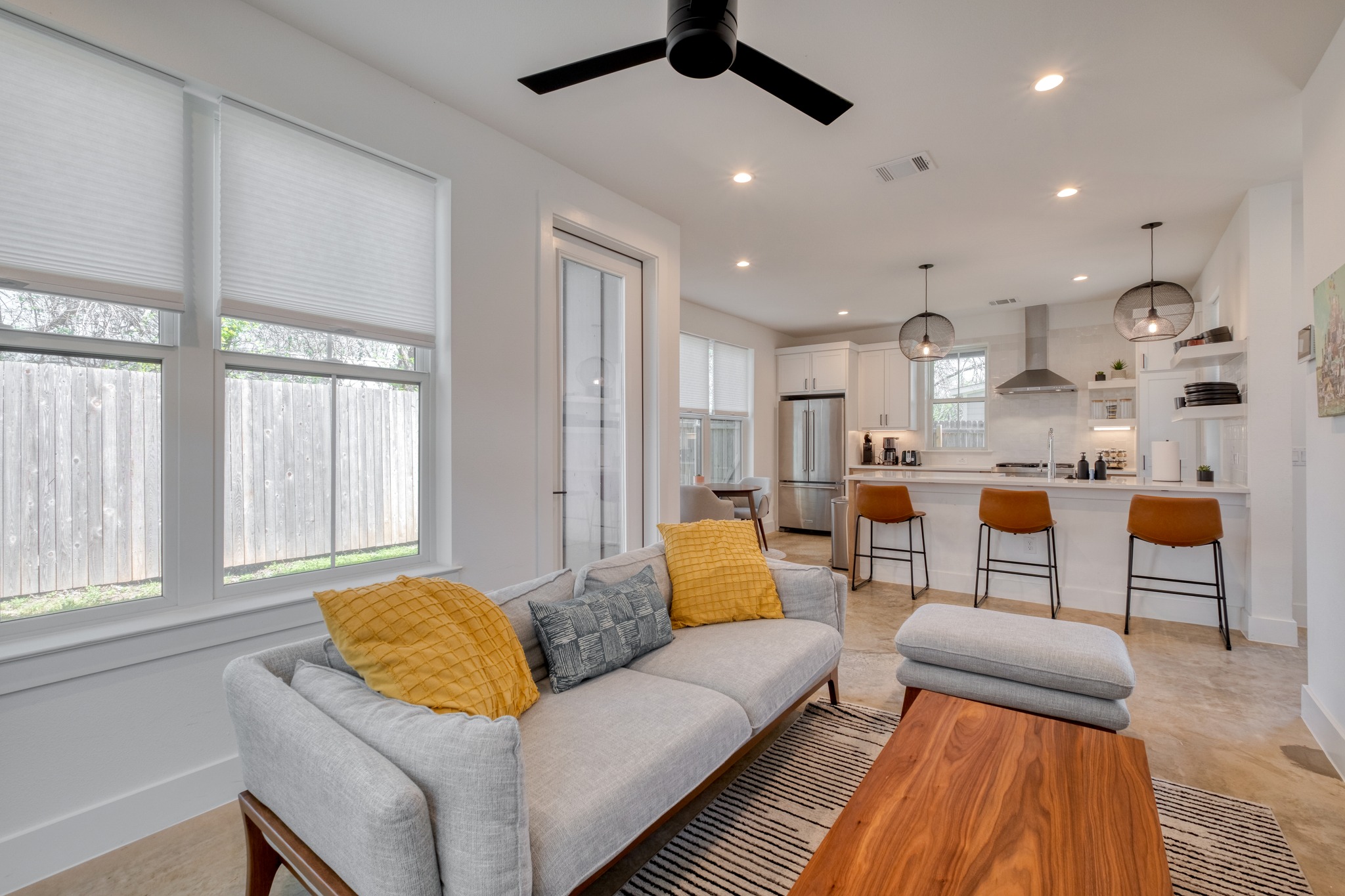 5406 Downs Drive, Unit 2 Austin, TX 78721 - Photo 12 of 24 a living room with furniture and a large window