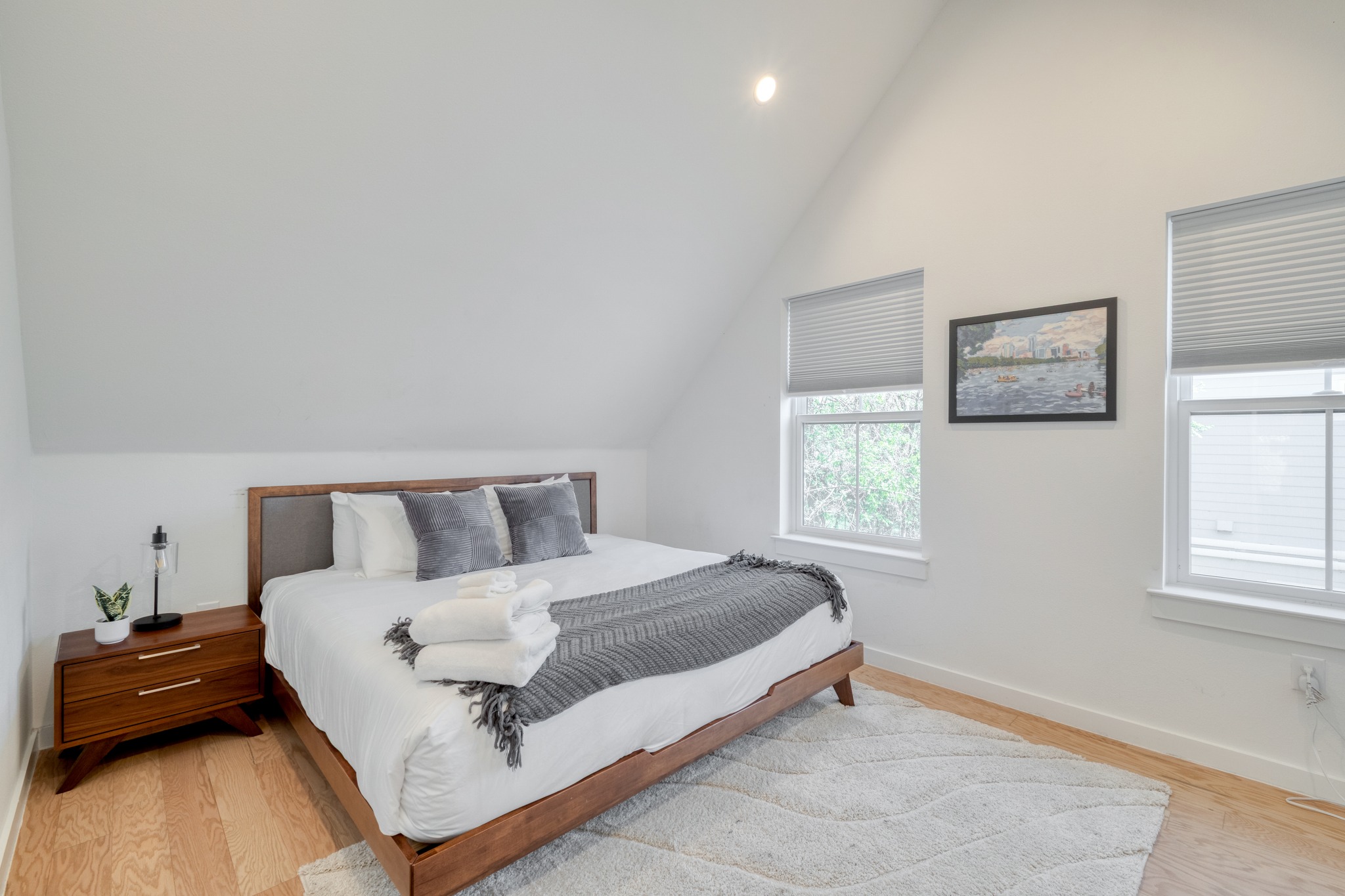 5406 Downs Drive, Unit 2 Austin, TX 78721 - Photo 14 of 24 a bed room with a bed and a window