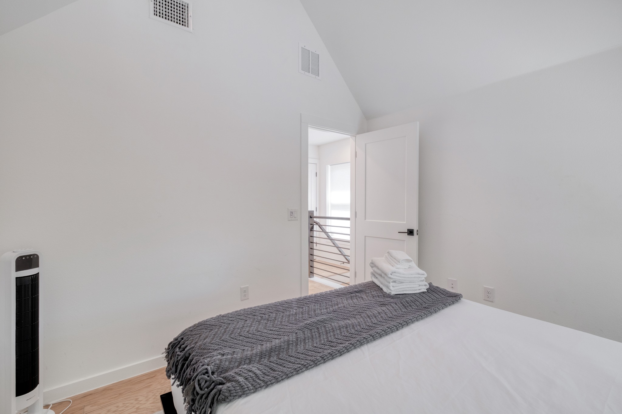 5406 Downs Drive, Unit 2 Austin, TX 78721 - Photo 17 of 24 a bedroom with a bed and a window