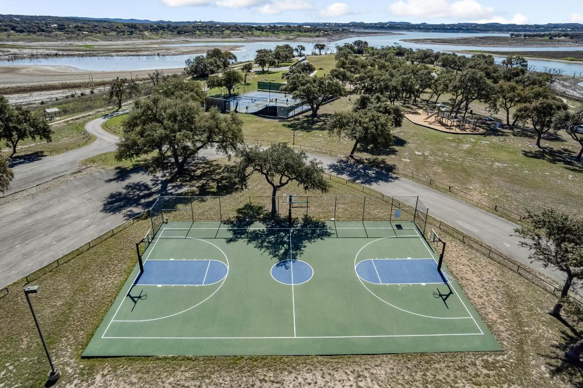 1281 Mystic Parkway Spring Branch, TX 78070 - Photo 16 of 20 a view of a balcony with dining table and chairs