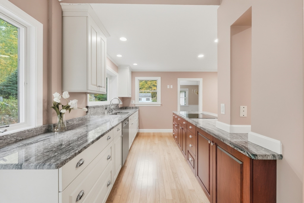 56 Century Mill Road Bolton, MA 01740 - Photo 11 of 41 a bathroom with granite countertop a sink a large mirror and a window