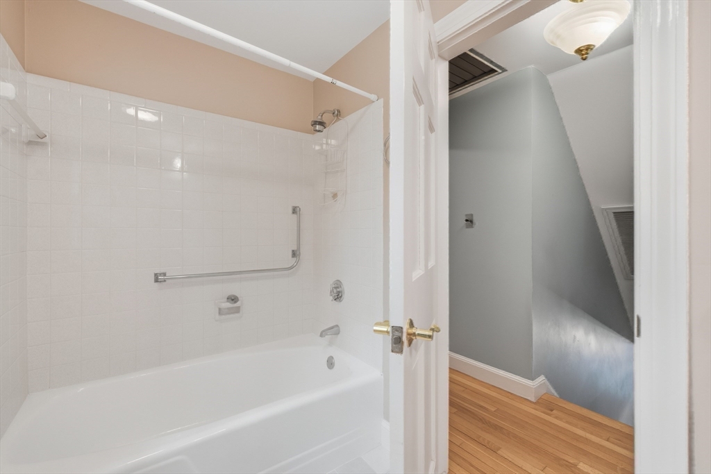 56 Century Mill Road Bolton, MA 01740 - Photo 32 of 41 a bathroom with a bathtub and a shower