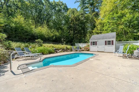 a view of backyard of a house