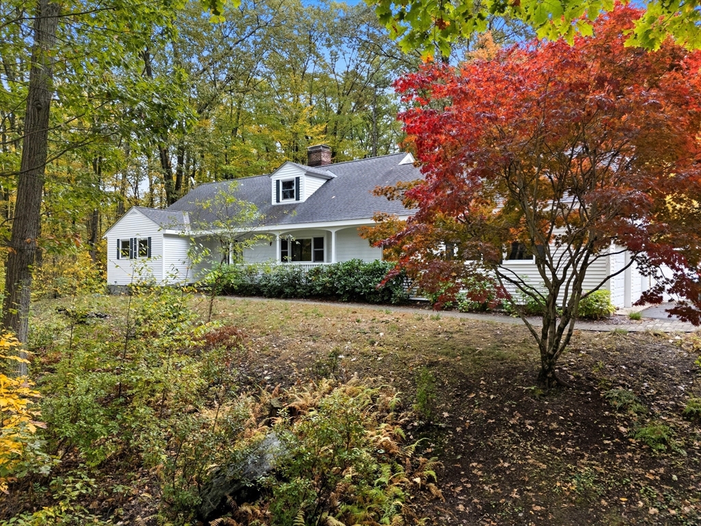56 Century Mill Road Bolton, MA 01740 - Photo 4 of 41 a house with a tree in front of it