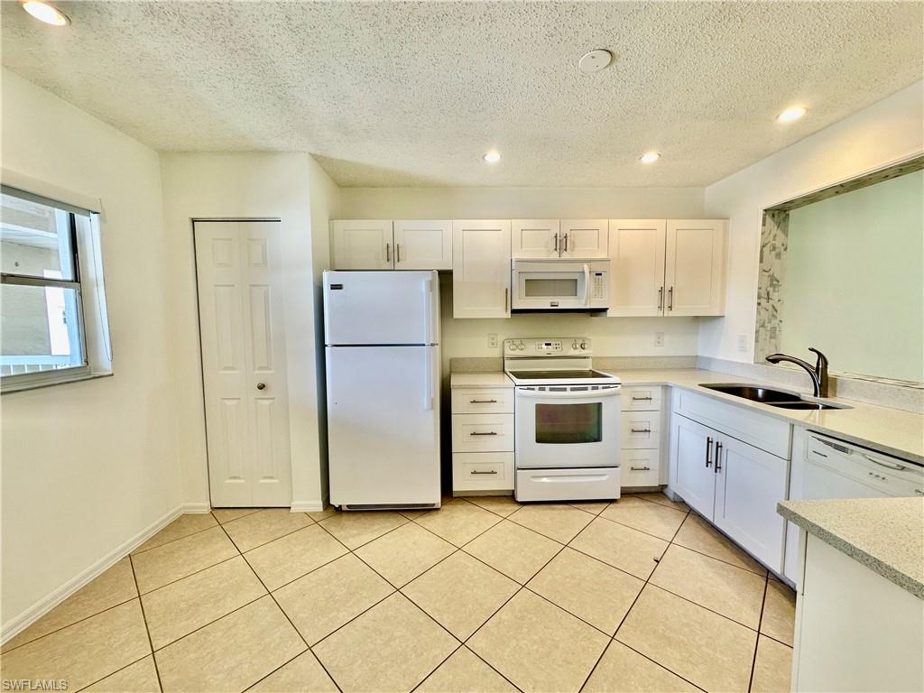 709 Landover Circle, Unit 202 Naples, FL 34104 - Photo 2 of 26