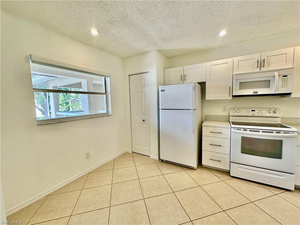 709 Landover Circle, Unit 202 Naples, FL 34104 - Photo 3 of 26