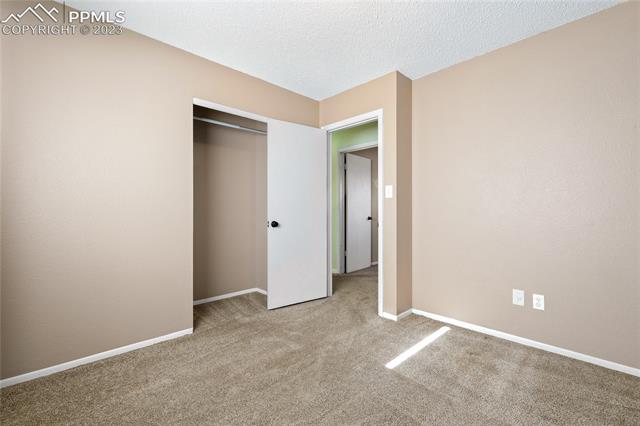 6786 Dale Road Colorado Springs, CO 80915 - Photo 12 of 23 Vaulted Main Level Bedroom #2