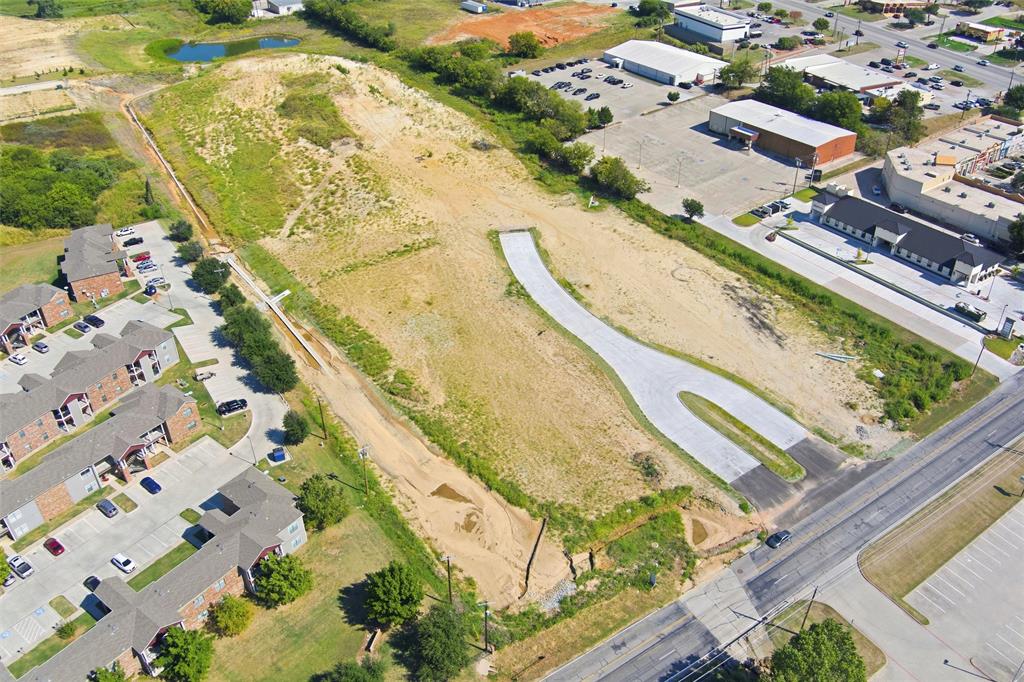 1 Vista Drive Decatur, TX 76234 - Photo 8 of 23 Aerial view of property and surrounding area featuring nearby suburban area and a large body of water