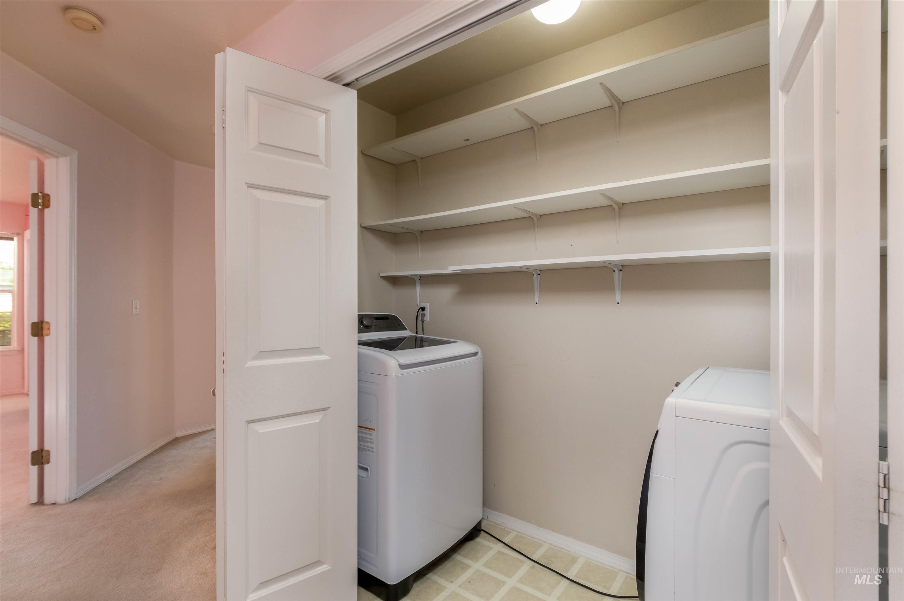 1811 Cleveland Street Boise, ID 83705 - Photo 12 of 30 Washroom with washing machine and dryer and light floors