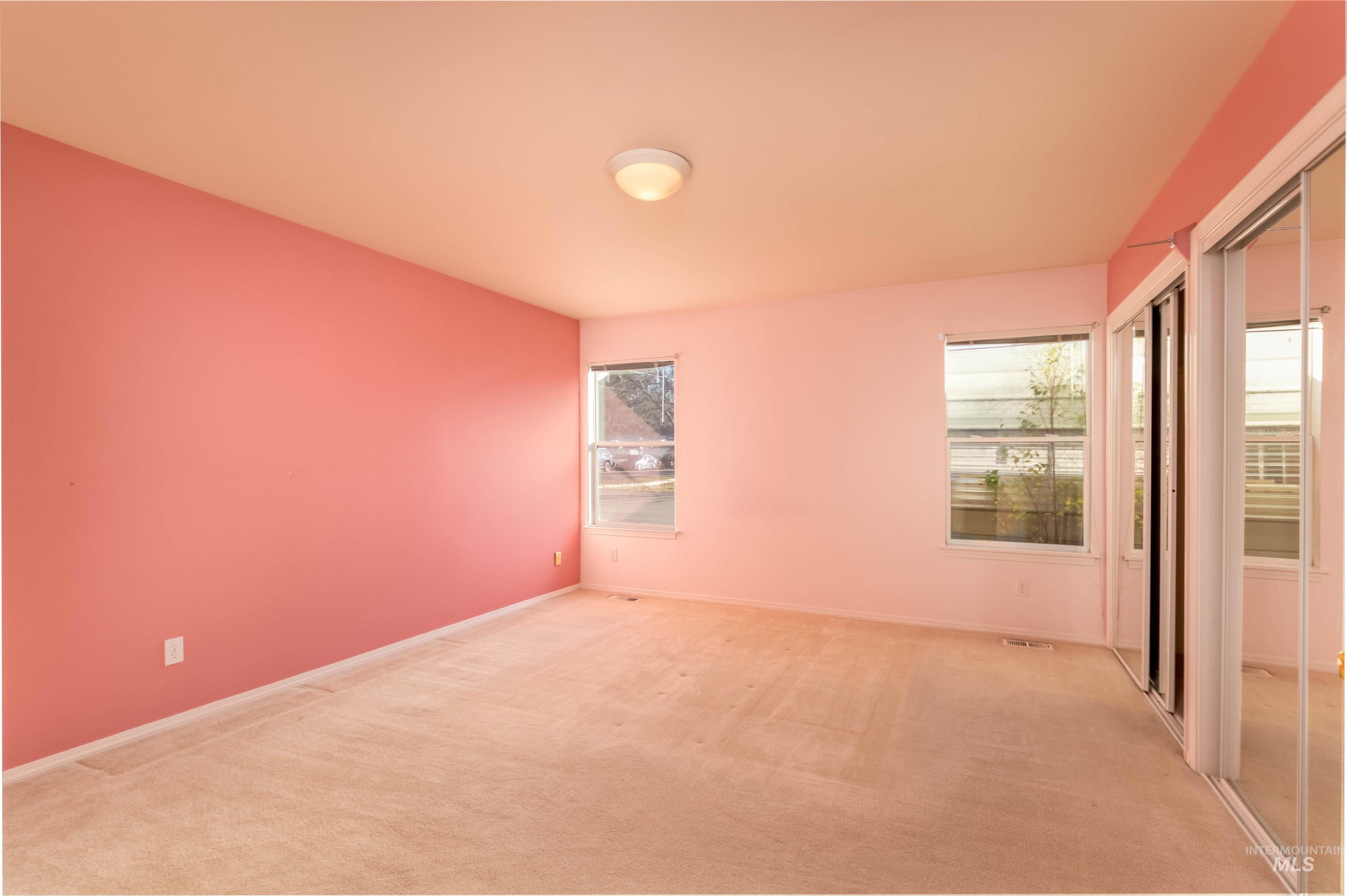 1811 Cleveland Street Boise, ID 83705 - Photo 13 of 30 Carpeted empty room featuring baseboards
