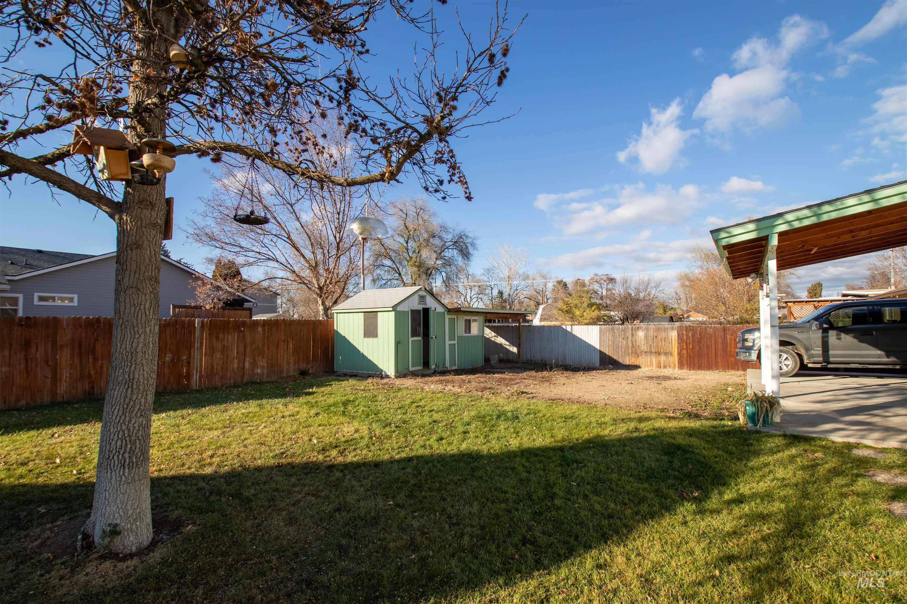 1811 Cleveland Street Boise, ID 83705 - Photo 22 of 30 Fenced backyard with a storage shed