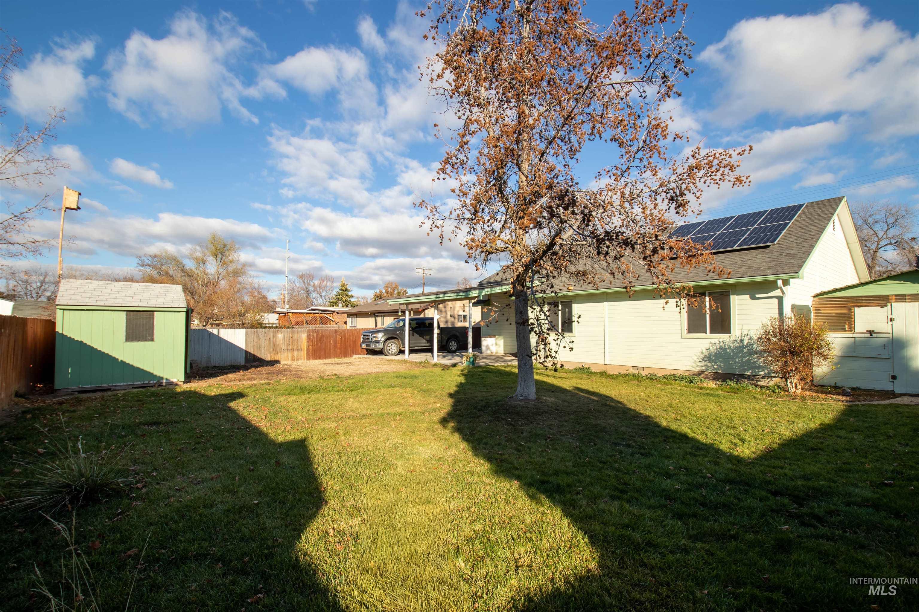 1811 Cleveland Street Boise, ID 83705 - Photo 24 of 30 Fenced backyard featuring a storage shed