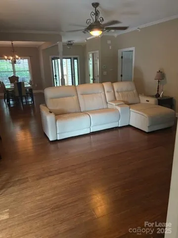 a bedroom with a large bed and a large window