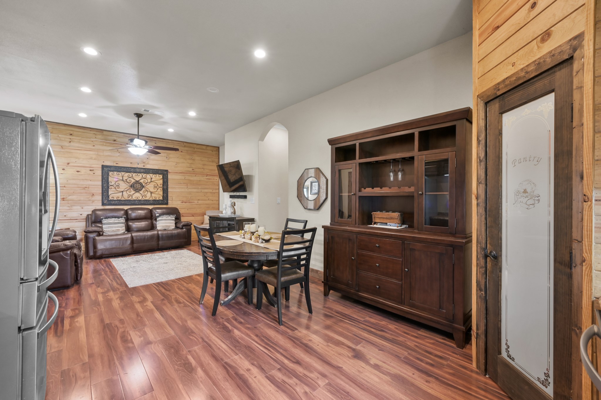 15306 Rabon Chapel Road Montgomery, TX 77316 - Photo 18 of 48 a view of a dining room with furniture window and wooden floor