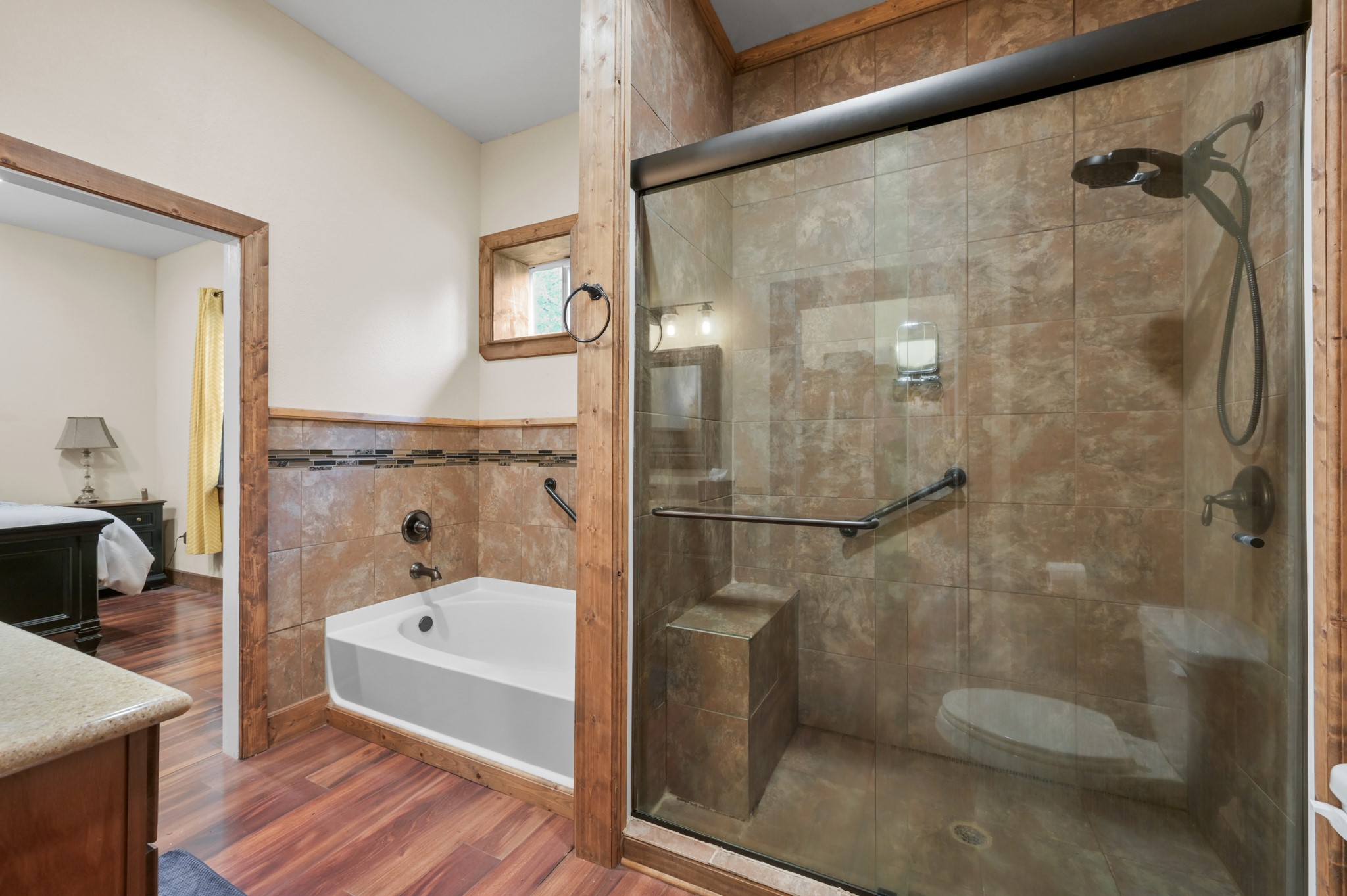 15306 Rabon Chapel Road Montgomery, TX 77316 - Photo 28 of 48 a bathroom with a bathtub and shower