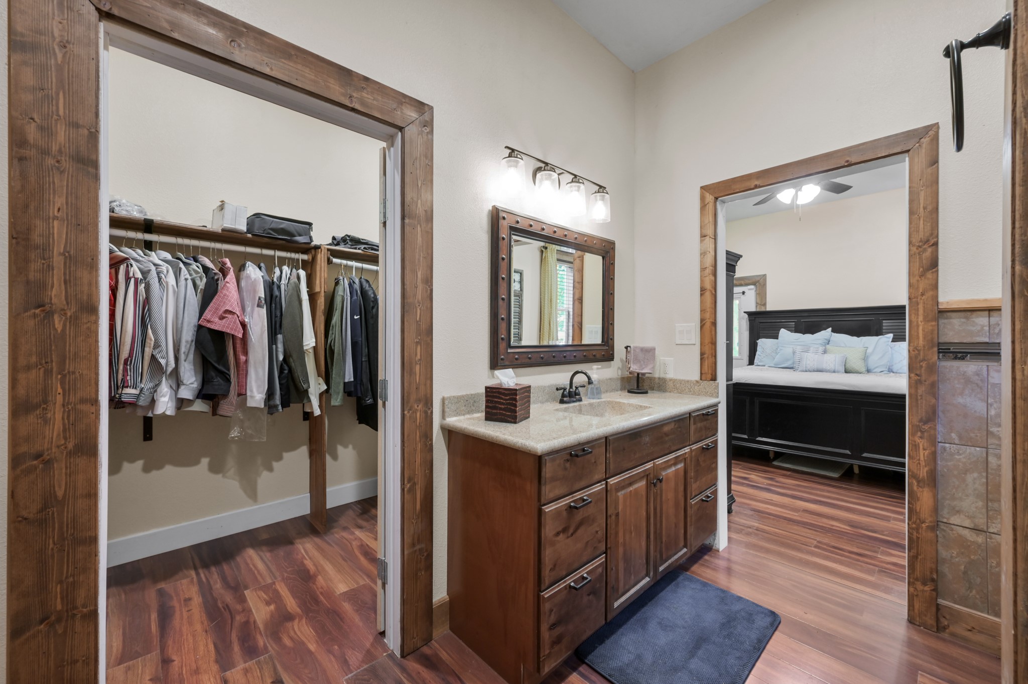 15306 Rabon Chapel Road Montgomery, TX 77316 - Photo 29 of 48 a bathroom with a sink a mirror and a shower