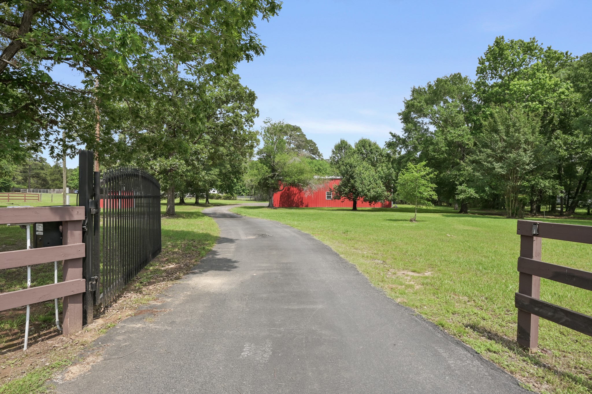 15306 Rabon Chapel Road Montgomery, TX 77316 - Photo 3 of 48 a view of a park with large trees