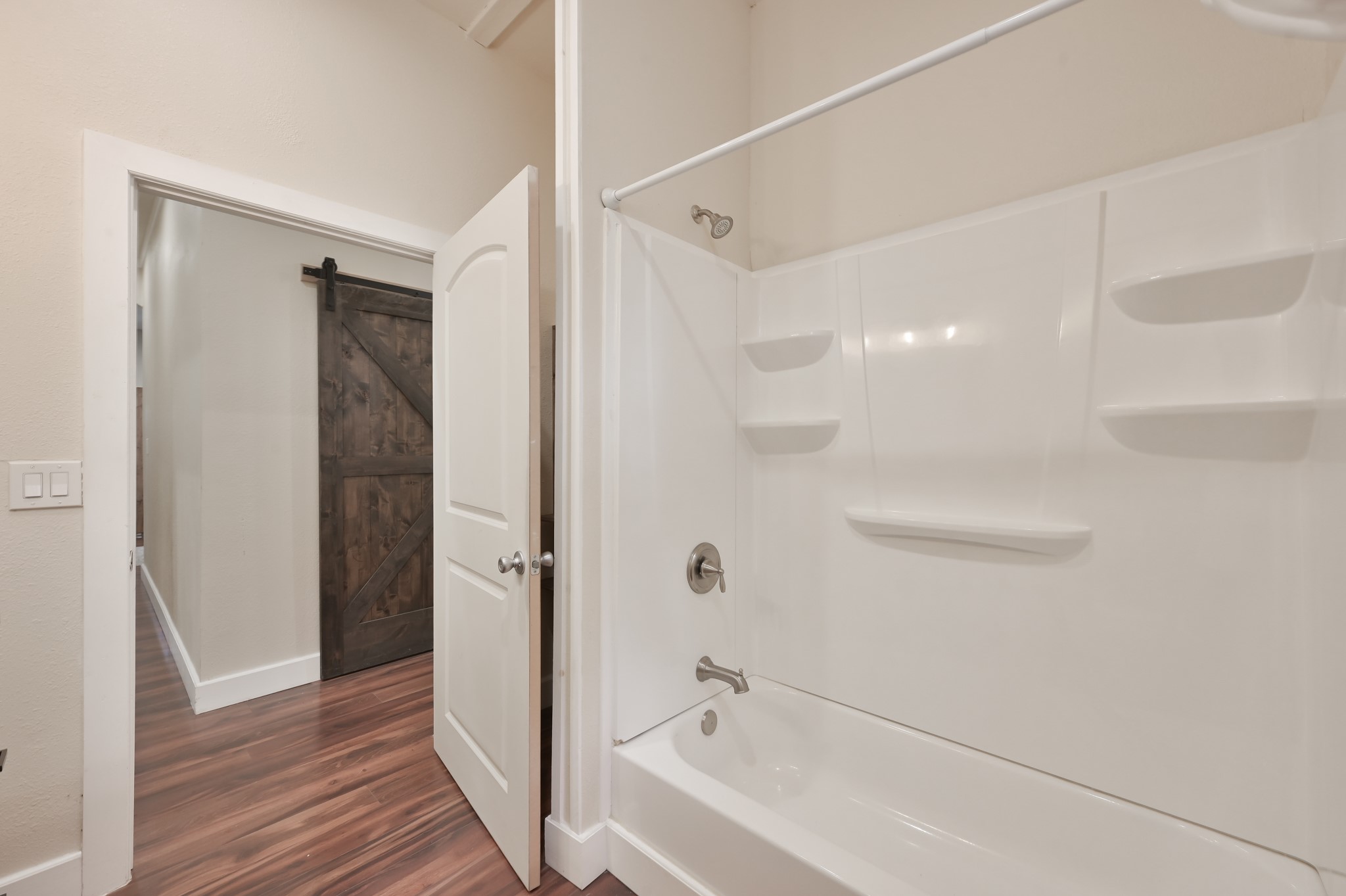 15306 Rabon Chapel Road Montgomery, TX 77316 - Photo 32 of 48 a bathroom with a bathtub and a shower