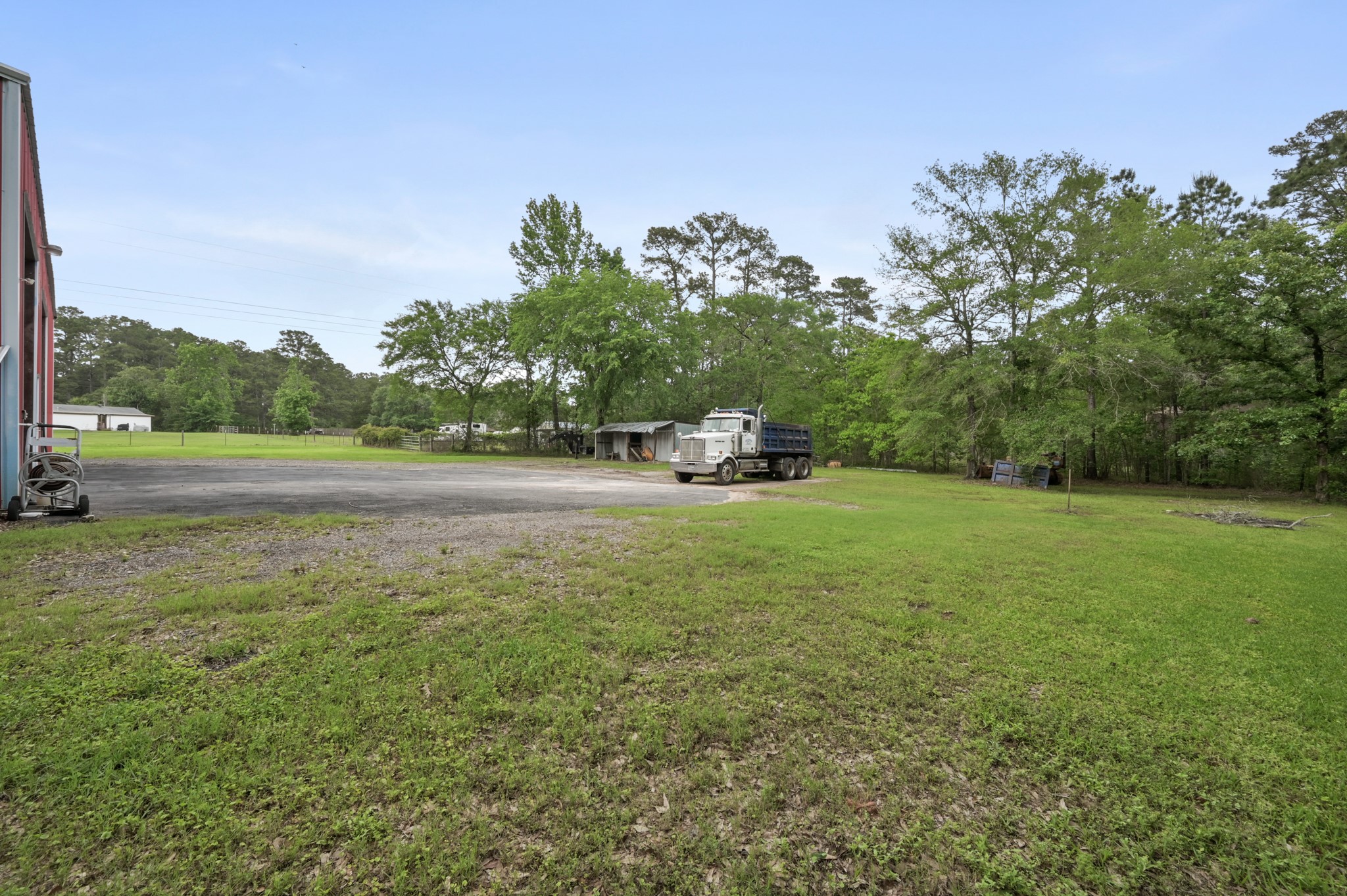 15306 Rabon Chapel Road Montgomery, TX 77316 - Photo 38 of 48 a view of a field of grass and trees