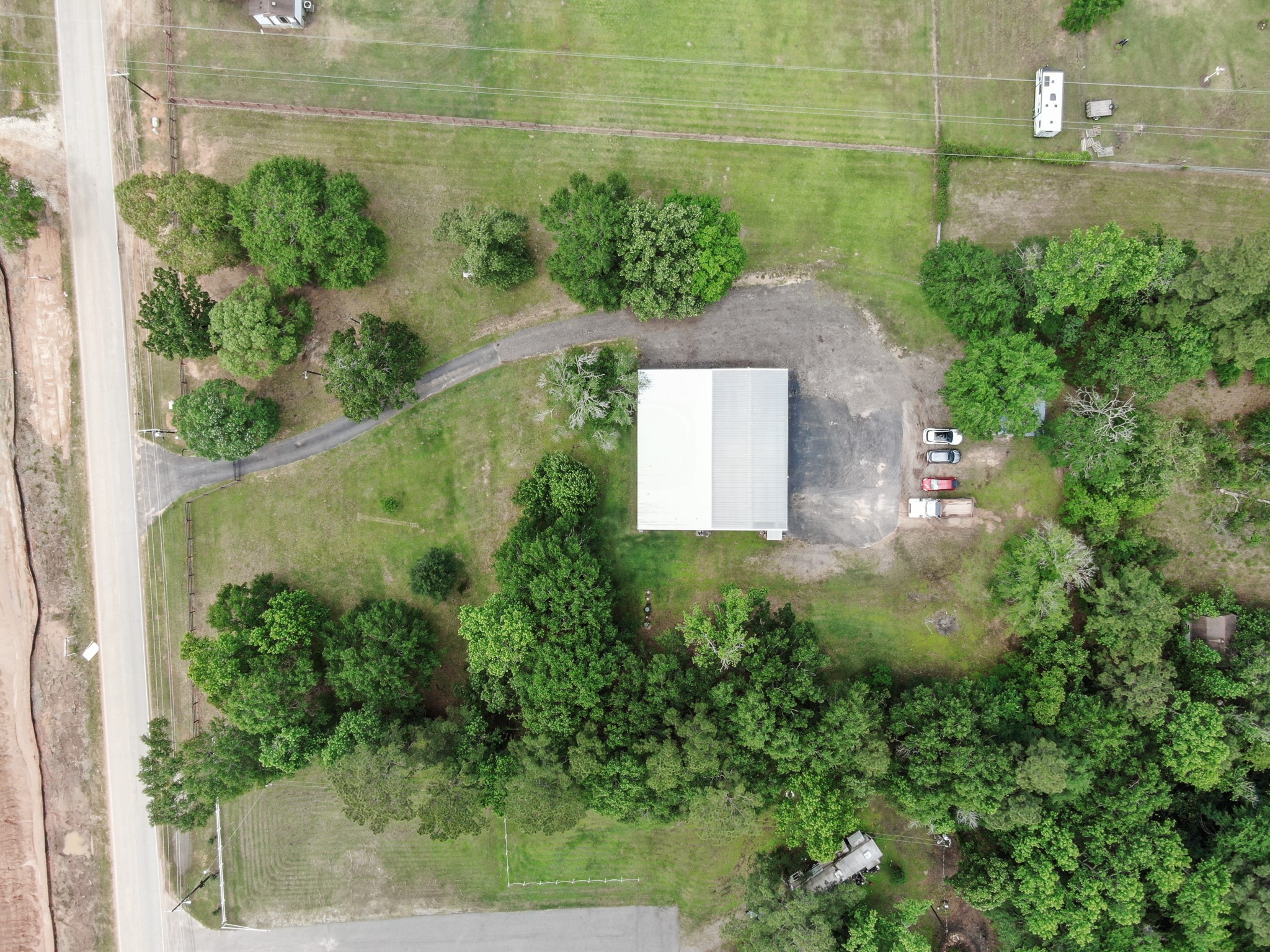 15306 Rabon Chapel Road Montgomery, TX 77316 - Photo 45 of 48 an aerial view of a house with a yard