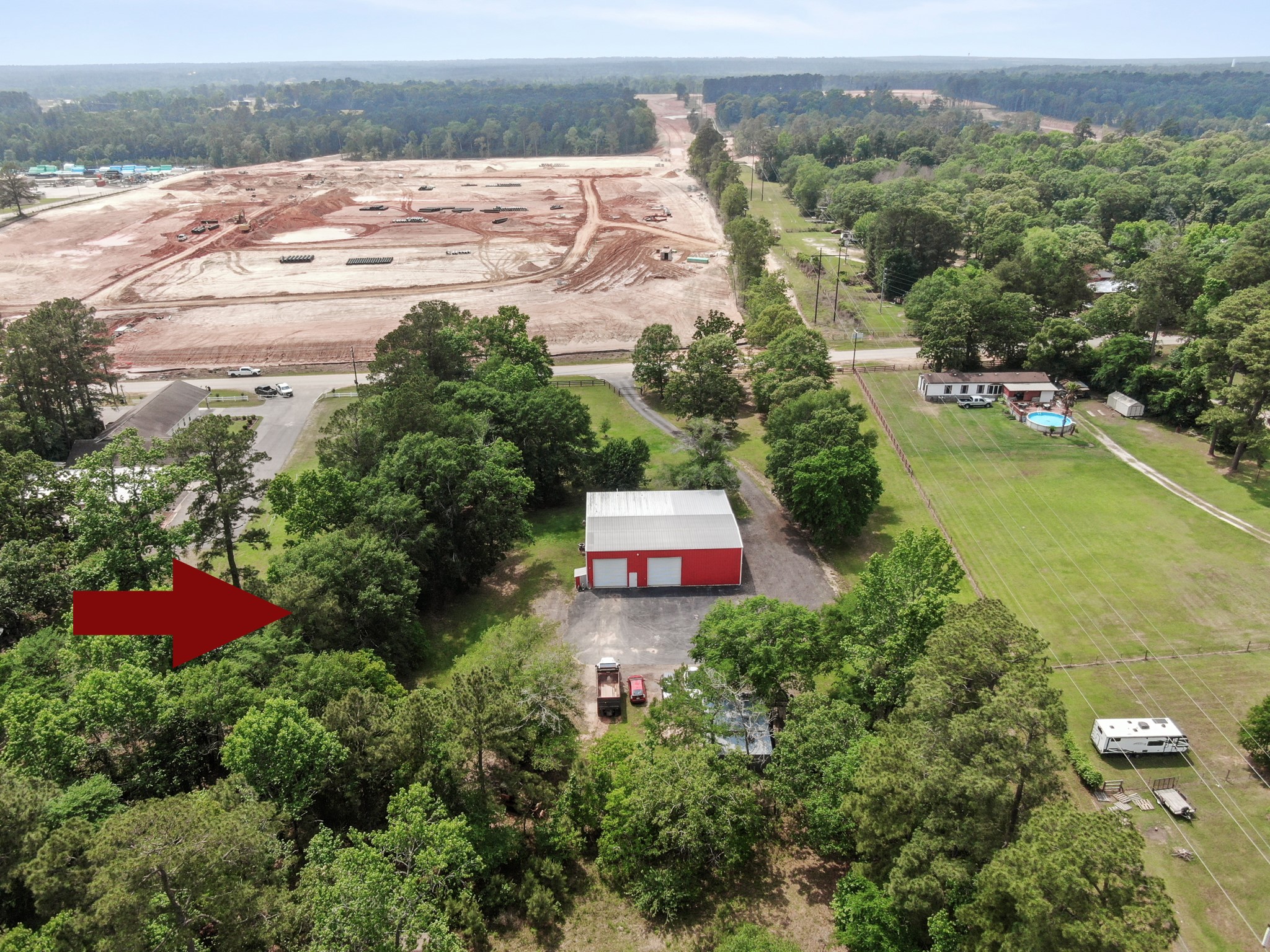 15306 Rabon Chapel Road Montgomery, TX 77316 - Photo 46 of 48 an aerial view of residential houses with outdoor space and river