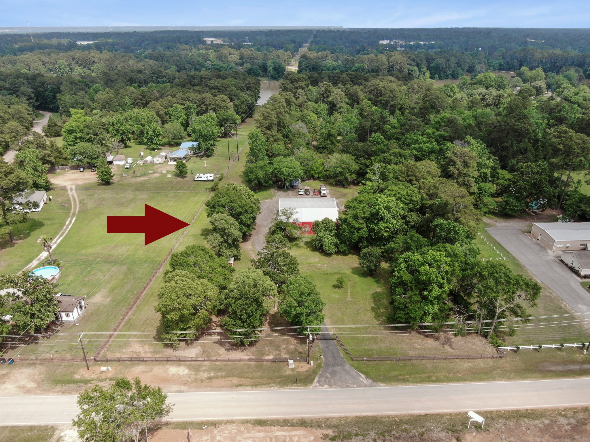 15306 Rabon Chapel Road Montgomery, TX 77316 - Photo 47 of 48 an aerial view of residential houses with outdoor space and street view