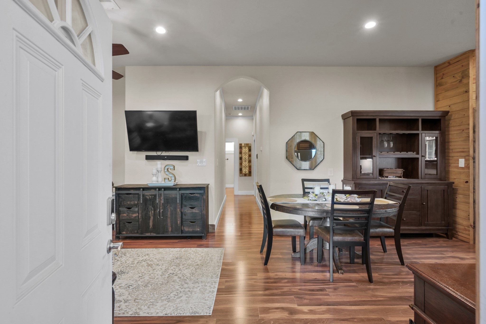 15306 Rabon Chapel Road Montgomery, TX 77316 - Photo 8 of 48 a view of a dining room with furniture window and wooden floor