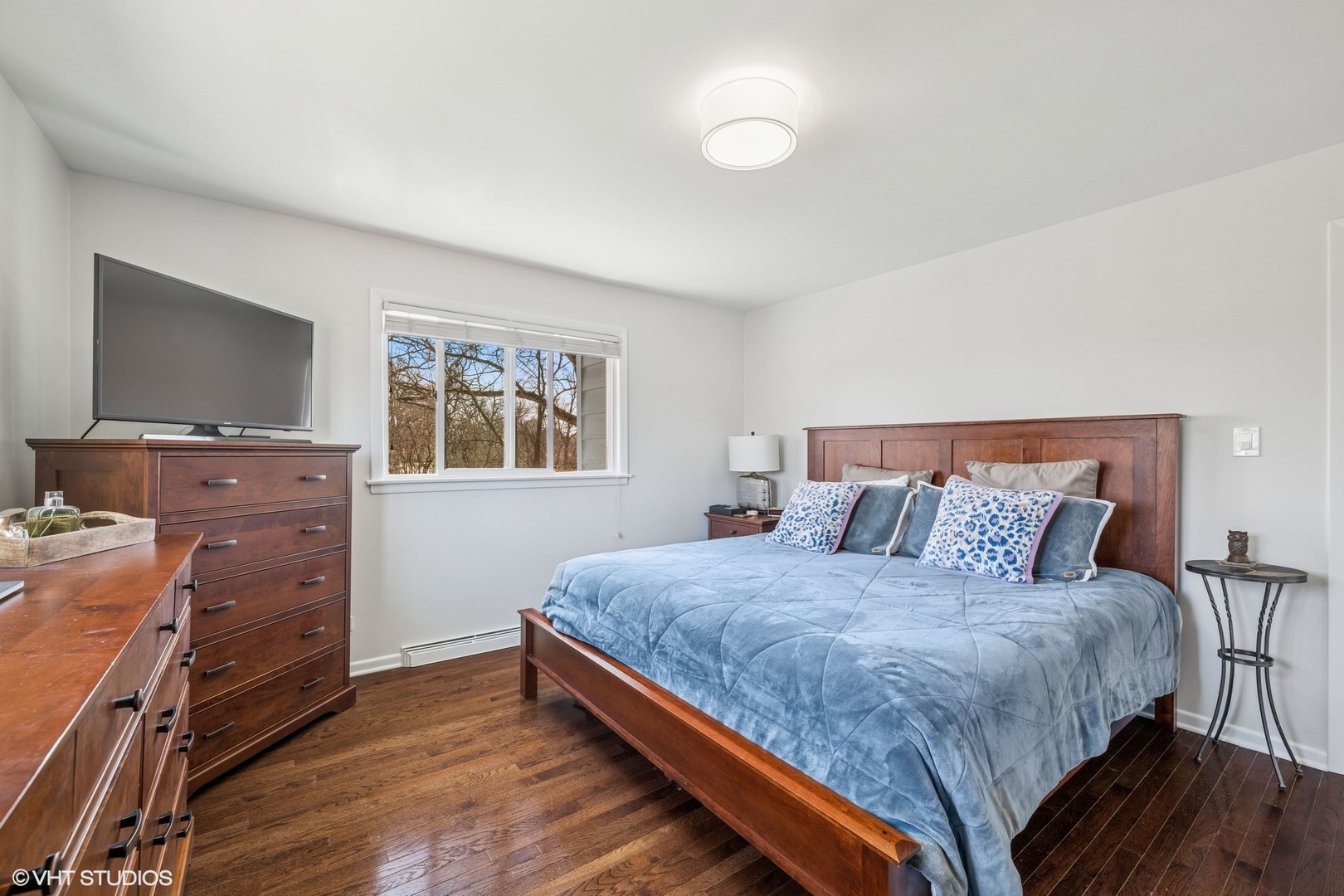 761 Kipling Place Deerfield, IL 60015 - Photo 13 of 27 a bedroom with a bed and a flat screen tv