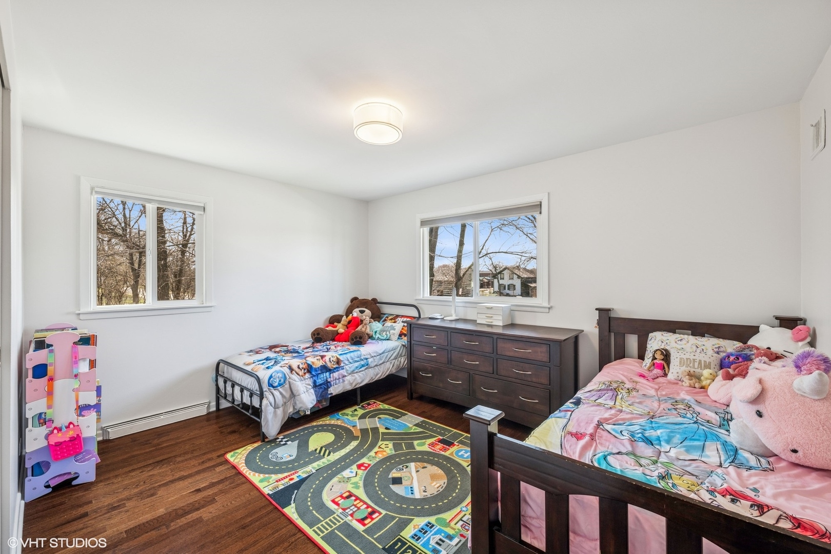 761 Kipling Place Deerfield, IL 60015 - Photo 16 of 27 a bedroom with two beds and a dresser in it